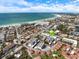 Desirable community's aerial view reveals proximity to the beach, ocean, and local attractions, with a shared community pool at 116 Vista Hermosa Cir # 204C, Sarasota, FL 34242