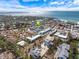 A captivating aerial perspective displays the building's layout, surrounding areas, and neighborhood at 116 Vista Hermosa Cir # 204C, Sarasota, FL 34242