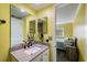 Bathroom featuring granite counters, makeup mirror and doorway to bedroom at 116 Vista Hermosa Cir # 204C, Sarasota, FL 34242