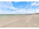 The gentle waves, soft sands, and bright skies create a peaceful and inviting beach scene at 116 Vista Hermosa Cir # 204C, Sarasota, FL 34242