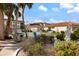 Community BBQ area with well-maintained landscaping, providing a great space for gatherings and outdoor enjoyment at 116 Vista Hermosa Cir # 204C, Sarasota, FL 34242