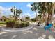 Charming community with lush landscaping and inviting BBQ area, perfect for socializing and enjoying outdoor activities at 116 Vista Hermosa Cir # 204C, Sarasota, FL 34242