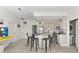 Bright kitchen with stainless steel appliances and a center island with seating at 116 Vista Hermosa Cir # 204C, Sarasota, FL 34242