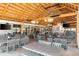 Spacious restaurant interior with ample seating under a thatched roof at 116 Vista Hermosa Cir # 204C, Sarasota, FL 34242