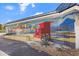 Vibrant 'Welcome to Siesta Key' mural with a lifeguard stand and beach scene at 116 Vista Hermosa Cir # 204C, Sarasota, FL 34242
