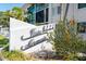 Community sign with lush landscaping, named Vista Hermosa at 116 Vista Hermosa Cir # 204C, Sarasota, FL 34242