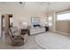 Cozy living room with comfortable seating, natural light, and calming decor at 12007 Clubhouse Dr, Lakewood Ranch, FL 34202