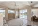 Bright living room featuring a view of the pool, with access to the screened patio at 12007 Clubhouse Dr, Lakewood Ranch, FL 34202