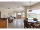 Living space combines the living, dining, and kitchen spaces with an open layout and tile flooring at 12007 Clubhouse Dr, Lakewood Ranch, FL 34202