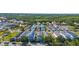 An aerial perspective highlights well-arranged homes, manicured lawns, and tree-lined streets, creating an inviting and harmonious community at 12520 Shimmering Oak Cir, Venice, FL 34293