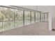 Enclosed and carpeted balcony with a view at 1609 Bayhouse Point Dr # 232, Sarasota, FL 34231