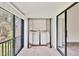 Enclosed balcony with washer and dryer at 1609 Bayhouse Point Dr # 232, Sarasota, FL 34231