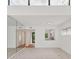 Open-concept living space with modern kitchen and ample natural light at 1609 Bayhouse Point Dr # 232, Sarasota, FL 34231