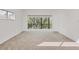 Bright, spacious living room with a view of the outside at 1609 Bayhouse Point Dr # 232, Sarasota, FL 34231
