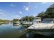 Marina with boats docked at the pier on a sunny day at 1609 Bayhouse Point Dr # 232, Sarasota, FL 34231