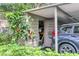 Covered parking with storage shed at 1609 Bayhouse Point Dr # 232, Sarasota, FL 34231