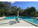 Community pool with ample seating, perfect for relaxing and socializing outdoors at 1609 Bayhouse Point Dr # 232, Sarasota, FL 34231