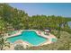 Aerial view of a beautiful community swimming pool area at 1609 Bayhouse Point Dr # 232, Sarasota, FL 34231