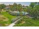 Aerial view of tropical pool and garden area at 1609 Bayhouse Point Dr # 232, Sarasota, FL 34231