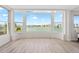 A bay window showcasing waterfront views at 174 Golden Gate Pt # 21, Sarasota, FL 34236