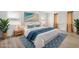 Cozy bedroom featuring a comfortable bed, stylish decor, and ample natural light at 174 Golden Gate Pt # 21, Sarasota, FL 34236