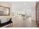 Open-concept living area features sleek flooring, bright windows, and modern decor for a stylish, airy space at 174 Golden Gate Pt # 21, Sarasota, FL 34236