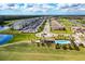 This aerial view captures the community's pool, clubhouse, and manicured landscaping at 18114 Gawthrop Dr # 201, Bradenton, FL 34211