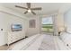 Cozy bedroom features a king bed, soft lighting, and a calming view at 18114 Gawthrop Dr # 201, Bradenton, FL 34211