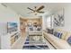 Comfortable living room with stylish furnishings and open-concept kitchen creates a welcoming atmosphere at 18114 Gawthrop Dr # 201, Bradenton, FL 34211