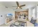 Inviting living room features neutral tones and an open layout with an eat-in kitchen at 18114 Gawthrop Dr # 201, Bradenton, FL 34211