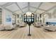 Elegant clubhouse lobby with comfortable seating and a modern fireplace at 18114 Gawthrop Dr # 201, Bradenton, FL 34211