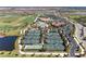 Aerial image of multiple well-maintained tennis courts near a clubhouse, perfect for an active lifestyle at 18114 Gawthrop Dr # 201, Bradenton, FL 34211