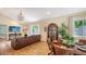 Inviting living area with hardwood floors, dining table, and comfortable seating arrangement at 1934 Bougainvillea St, Sarasota, FL 34239