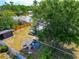 Overhead shot showing the backyard with a seating area, shed, and partial fencing at 2004 19Th W St, Bradenton, FL 34205