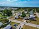 An aerial view showcases the property nestled in a well-established neighborhood with mature landscaping at 2004 19Th W St, Bradenton, FL 34205