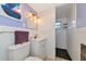 Bright bathroom with white tile, a glass-enclosed shower, and updated fixtures at 2004 19Th W St, Bradenton, FL 34205