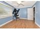 Bright bedroom featuring wood floors, a ceiling fan, and lots of natural light at 2004 19Th W St, Bradenton, FL 34205