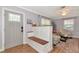 Bright entryway with a built-in bench, coat rack, and stylish decor at 2004 19Th W St, Bradenton, FL 34205