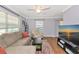 Comfortable living room with a large sofa, modern entertainment center, and plenty of space at 2004 19Th W St, Bradenton, FL 34205