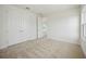 Bright bedroom with plush carpeting, a closet, and a window at 204 Eagleston Ln, Lakewood Ranch, FL 34240