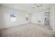 A large bedroom area is brightly lit and features neutral carpet and several windows at 204 Eagleston Ln, Lakewood Ranch, FL 34240