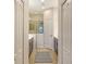 Bathroom featuring dual vanities, modern fixtures, and a walk-in shower at 229 Alento Ct, Nokomis, FL 34275