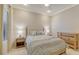 Bright bedroom with neutral tones, plush carpeting, and natural light creating a relaxing atmosphere at 229 Alento Ct, Nokomis, FL 34275