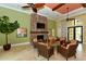 Charming clubhouse interior featuring a stone fireplace, comfortable seating, and elegant decor at 229 Alento Ct, Nokomis, FL 34275
