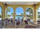 An outdoor lounge area overlooking the pool and spa at 229 Alento Ct, Nokomis, FL 34275