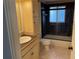 Bathroom features vanity sink, toilet, tile floor and tiled shower at 236 Davis Blvd, Sarasota, FL 34237