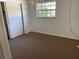 Comfortable bedroom with window and a closet at 236 Davis Blvd, Sarasota, FL 34237