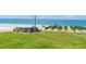 Beautiful beach access with pristine sandy shores and crystal clear water, perfect for relaxing or recreational activities at 2400 N Beach Rd # 1, Englewood, FL 34223