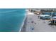 Serene beach with crystal-clear water, ideal for swimming, sunbathing, and relaxation at 2400 N Beach Rd # 1, Englewood, FL 34223