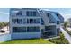 Inviting condo with private balconies, green lawn and cozy outdoor seating area at 2400 N Beach Rd # 1, Englewood, FL 34223